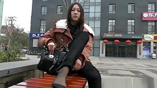 Beautiful teenager 18+ Black Nylon Soles Sitting On A Bench