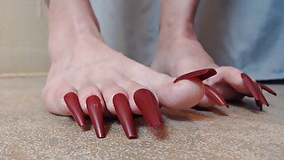 Clicking tapping long toe nails