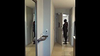 wetsuited orca almost caught at hotel door