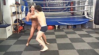 Muscle girl beats guy and makes him lick her pussy