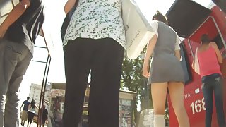 Candid up skirt video of yoga ass in black panties