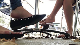 Amateur Hotties Dangling Their Shoes At The Caffee Bar In Public