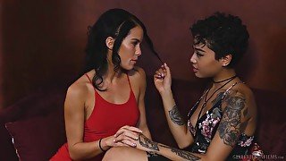 Cute temptress of a young woman Megan Rain having lesbian sex