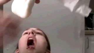 Young teen slut drinking her piss from diaper