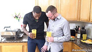 Interracial gay fucking with a long black cock in the kitchen