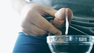 Thick cumshot into bowl