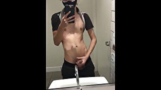 twink jerks off in public bathroom