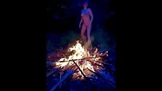 Kiki Seraf dancing by the fire