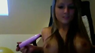 Beautiful blonde chick sucks her toy and then pokes her fanny with it