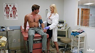 Medical professional Giselle Palmer helps out a strapping young buck