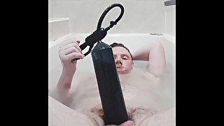 Pumping fat uncut cock in the tub and playing with my dick.