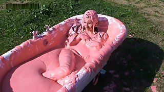 girl bath in slime with clothes