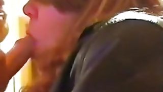 leathers sucking a guy at a party