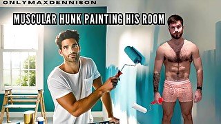 Muscular hunk painting his room