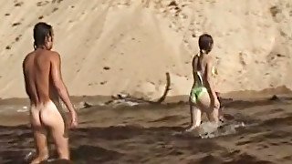 Lovely teen Angelina gives blowjob on the lonely beach