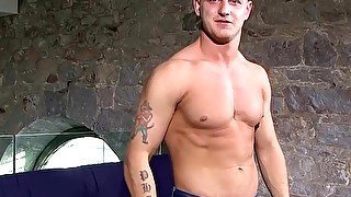 Muscle British jock Phill M masturbates after the interview