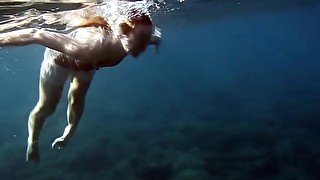 Nastya swimming nude in the sea