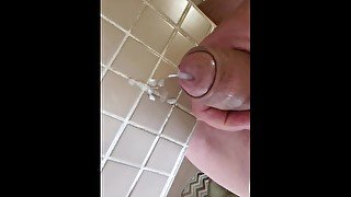 Straight horny guy masturbates his uncut cock with cum shot