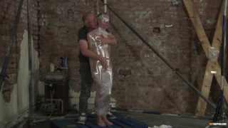 Cameron James gets plastic wrapped by Sebastian Kane 