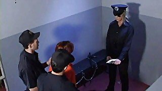 Redhead bitch gets fingered and toyed by a nasty babe in police uniform