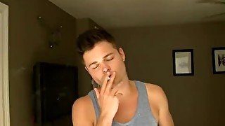 Cute chain smoker Dustin Fitch shows ass while masturbating