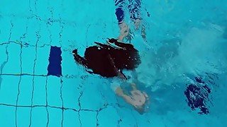 Swimming and stripping teen Piyavka in the pool