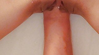 Fisting a teen's shaved pussy close up