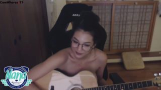 Cute plays the guitar