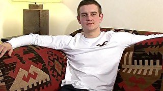 UK amateur Callum Astor strokes his cock after an interview