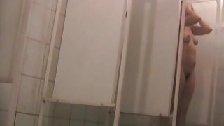 Shower spy cam amateur exposes tits and hairy cunt