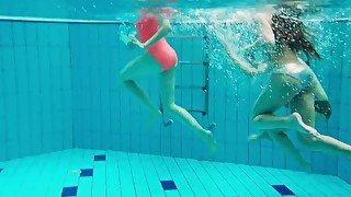 Three hot horny girls swim together