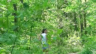 Teenager pees in the woods