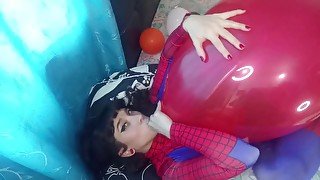 SPIDER GIRL SQUEEZING BALLOON WHILE B2P