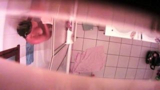 Sexy babe takes a shower and exposes herself on hidden cam