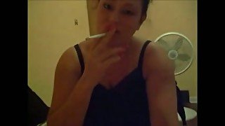 Nasty brunette bitch smokes and sucks my hard dick