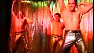 Come to the club as male dancers work the stage