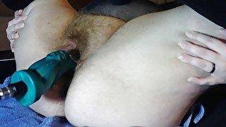 Hairy pussy pounded by dildo