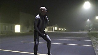 snake zentai exhibiting cock from hotel window and then parking lot