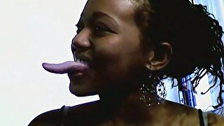 Damn! That ebony webcam babe has a very long tongue!