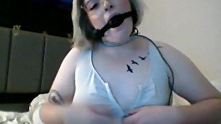 Girl with glasses choking and ball gag