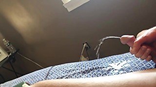 Lazy jerk piss on the bed