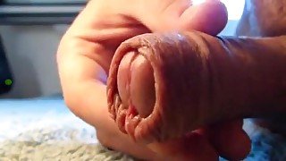 a close-up video of me playing with my foreskin.