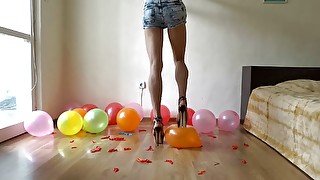 Balloons popping with my high heel sandals