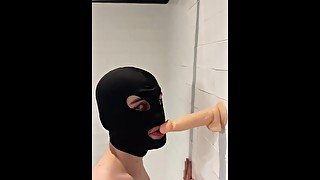 Twink deepthroating a dildo