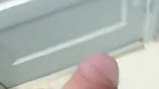 Jerking cock in bathroom