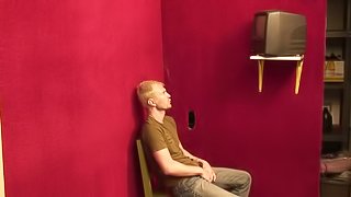 Blond Luke Cross gives a blowjob in glory hole show