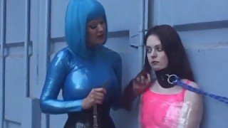 Latex Mistress Aradia restrains young dykes before toying