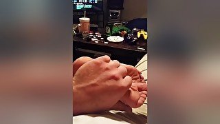 Enjoy Massaging My Amateur Babes Fantastic Feet While Playing Video Games