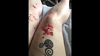 Slut plays with wax