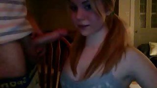 Pigtailed pretty auburn girl stood on knees and sucked my buddy on webcam